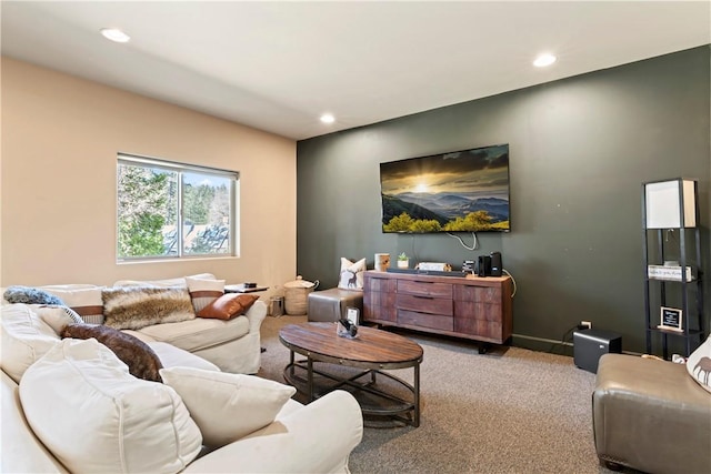 carpeted living room featuring recessed lighting and baseboards