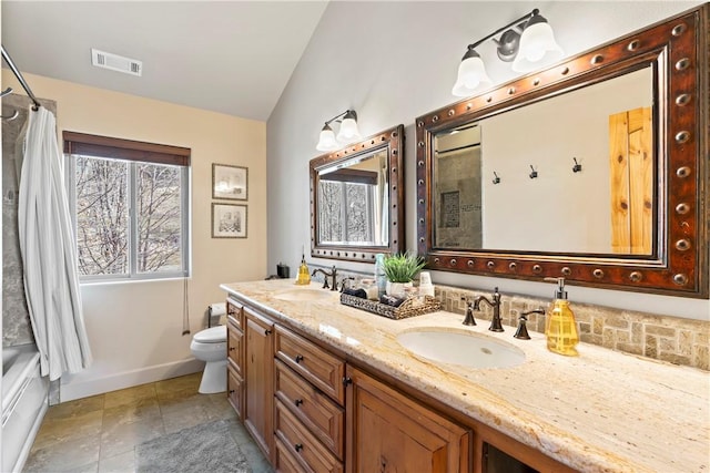 full bath featuring visible vents, vaulted ceiling, a sink, and toilet