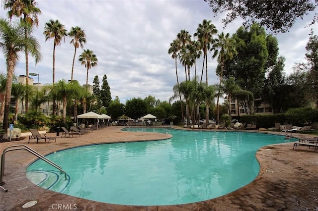 pool with a patio