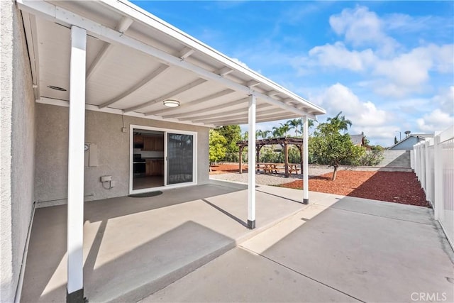10806 Bayonne Dr, Riverside, CA 92505 - view of patio / terrace with a pergola and a fenced backyard