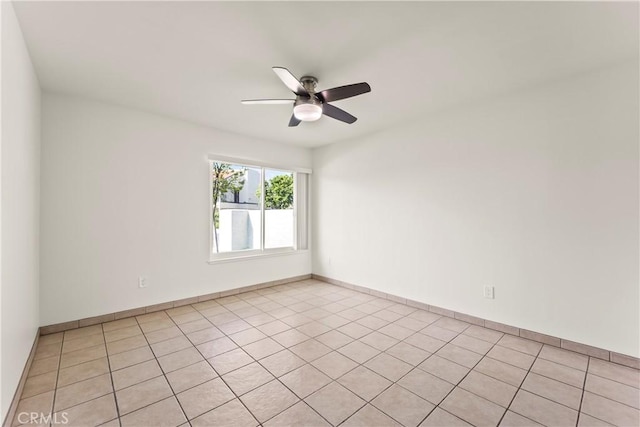 10806 Bayonne Dr, Riverside, CA 92505 - unfurnished room with light tile patterned floors, ceiling fan, and baseboards