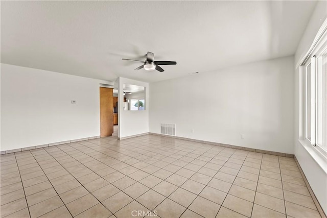 10806 Bayonne Dr, Riverside, CA 92505 - unfurnished room featuring visible vents, ceiling fan, light tile patterned flooring, and baseboards