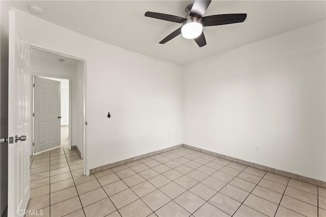 10806 Bayonne Dr, Riverside, CA 92505 - empty room with light tile patterned floors, baseboards, and a ceiling fan