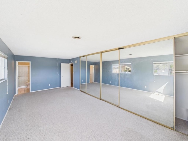 837 Oneonta St, Imperial Beach, CA 91932 - unfurnished bedroom featuring a closet, baseboards, and carpet floors