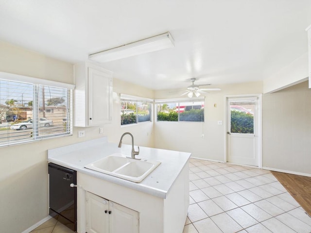 837 Oneonta St, Imperial Beach, CA 91932 - kitchen with baseboards, a peninsula, black dishwasher, ceiling fan, and a sink