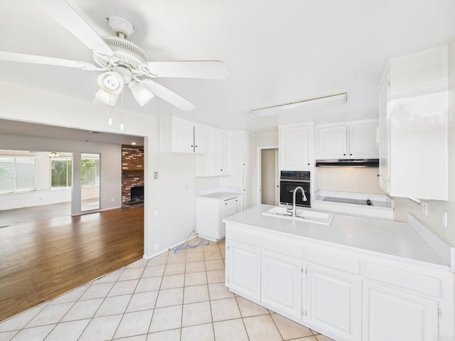 837 Oneonta St, Imperial Beach, CA 91932 - kitchen with a sink, white cabinets, and black appliances
