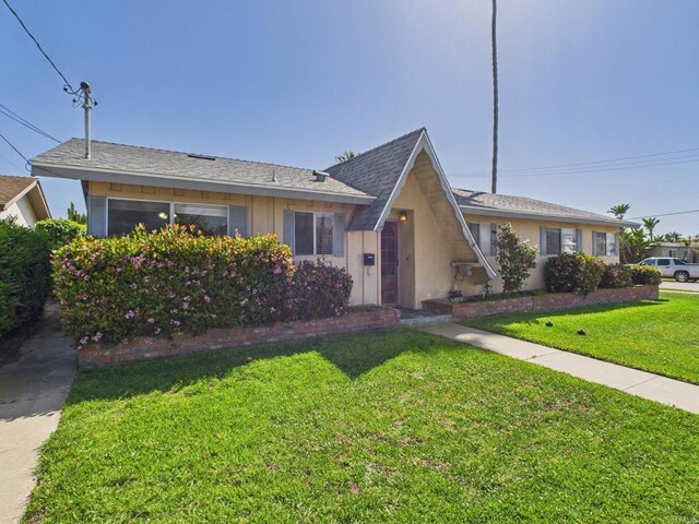 837 Oneonta St, Imperial Beach, CA 91932 - view of front of home with a front yard, stucco siding, and a shingled roof