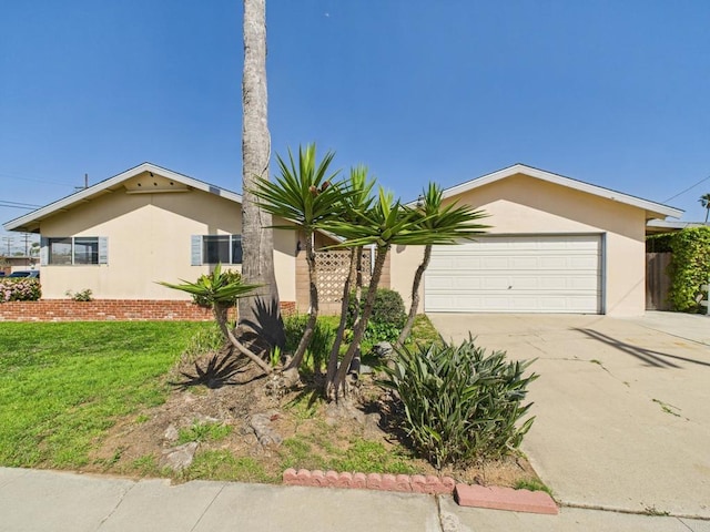 837 Oneonta St, Imperial Beach, CA 91932 - ranch-style home with concrete driveway, a front yard, stucco siding, and a garage