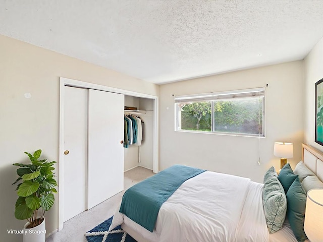 837 Oneonta St, Imperial Beach, CA 91932 - bedroom with a closet, light colored carpet, and a textured ceiling