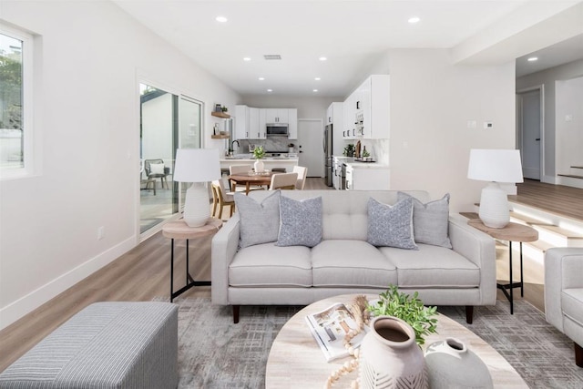 475 Parkwood Ln, Encinitas, CA 92024 - living area featuring light wood-type flooring and recessed lighting