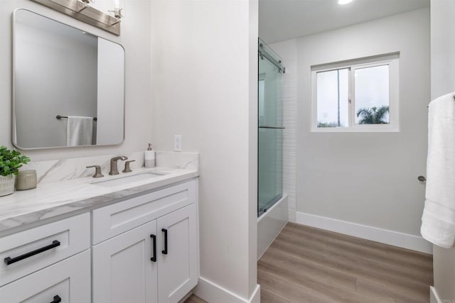 475 Parkwood Ln, Encinitas, CA 92024 - bathroom with vanity, wood finished floors, and enclosed tub / shower combo