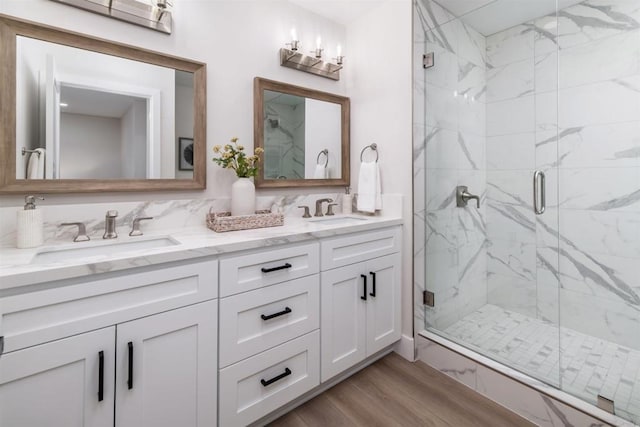 475 Parkwood Ln, Encinitas, CA 92024 - full bath with a marble finish shower, double vanity, and wood finished floors