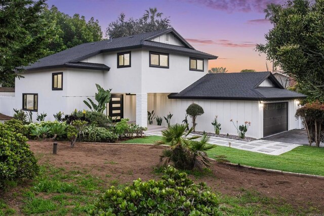 475 Parkwood Ln, Encinitas, CA 92024 - view of front of home with a garage, roof with shingles, and stucco siding