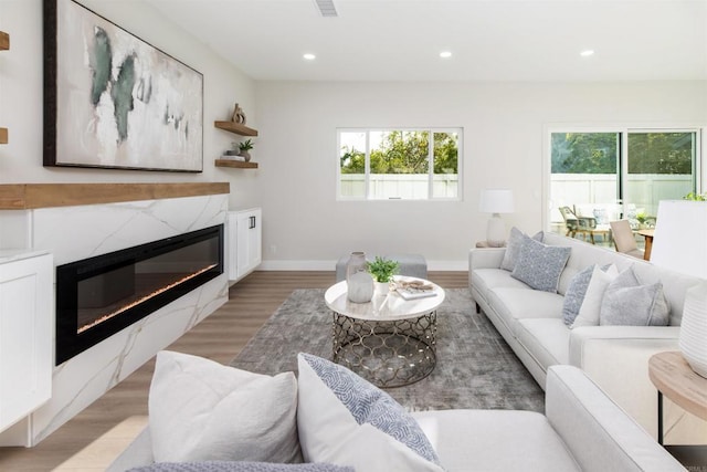 475 Parkwood Ln, Encinitas, CA 92024 - living room with light wood-style flooring, a fireplace, and recessed lighting
