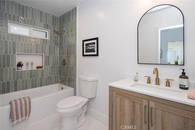 bathroom with baseboards, toilet,  shower combination, vanity, and tile patterned flooring