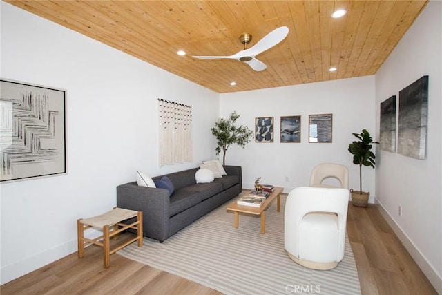 living room featuring wooden ceiling, wood finished floors, ceiling fan, and recessed lighting