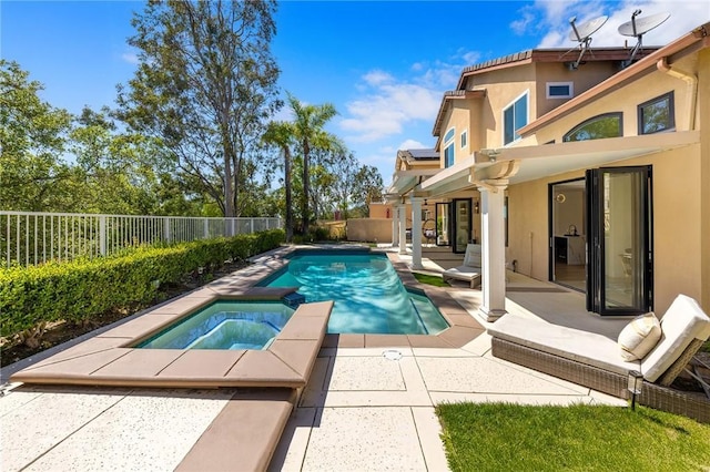 view of pool with a patio, a fenced backyard, a fenced in pool, and an in ground hot tub