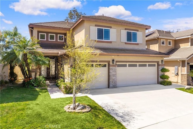 view of front of house featuring a front lawn, stucco siding, a tile roof, driveway, and a garage