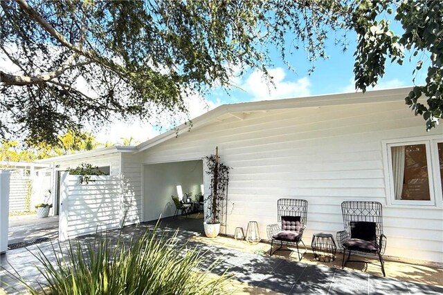 rear view of property with a patio area