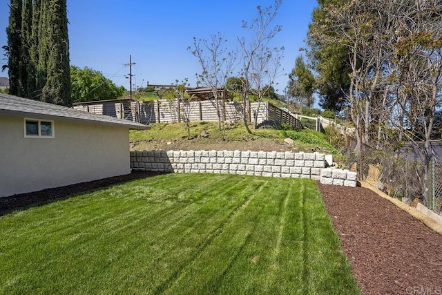 view of yard featuring fence