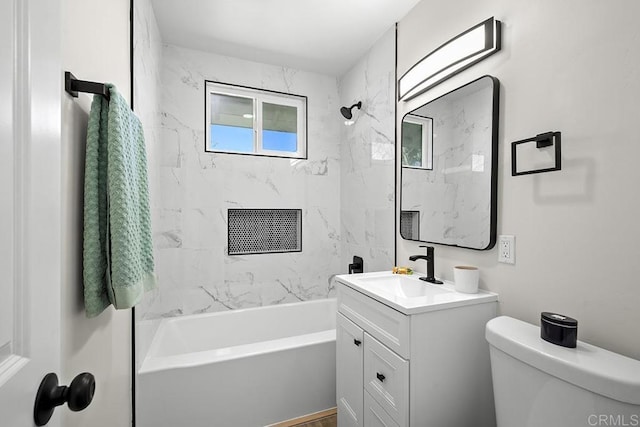 full bath with toilet, vanity, and shower / bath combination
