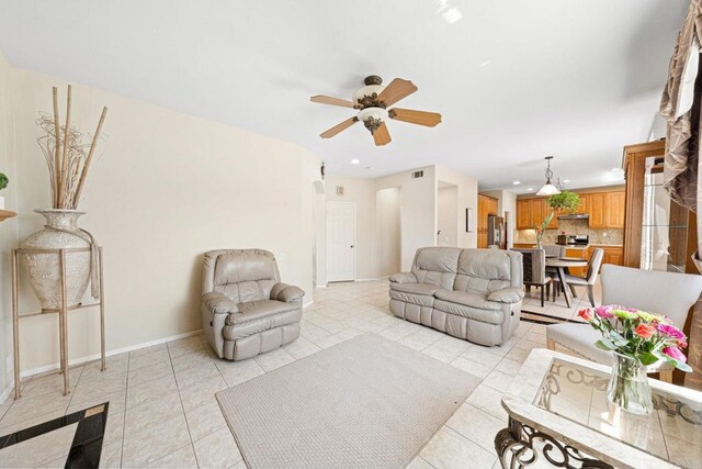 1396 Carneros Valley St, Chula Vista, CA 91913 - living room with a ceiling fan, recessed lighting, light tile patterned flooring, baseboards, and arched walkways