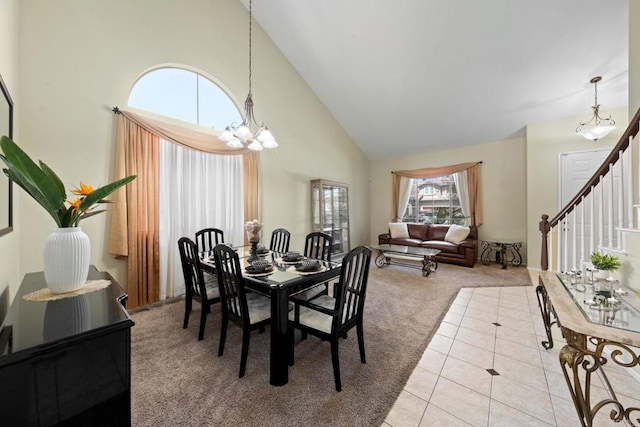 1396 Carneros Valley St, Chula Vista, CA 91913 - dining area with light colored carpet, high vaulted ceiling, a chandelier, light tile patterned floors, and stairs
