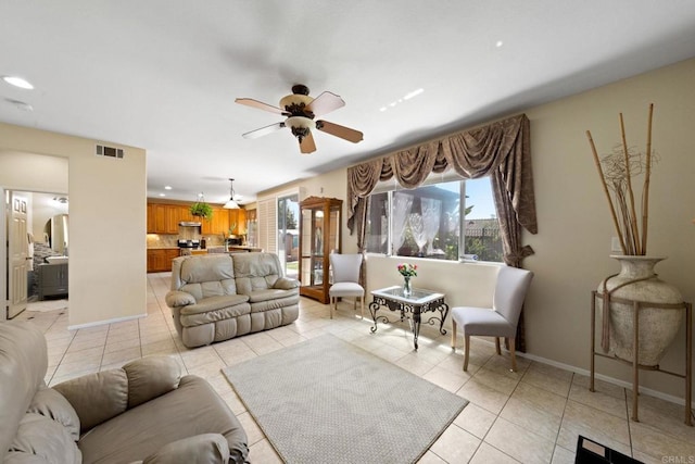 1396 Carneros Valley St, Chula Vista, CA 91913 - living area with ceiling fan, light tile patterned flooring, recessed lighting, and baseboards