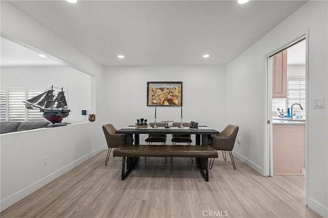 22041 Kinzie St, Chatsworth, CA 91311 - dining space with light wood-style floors, plenty of natural light, baseboards, and recessed lighting