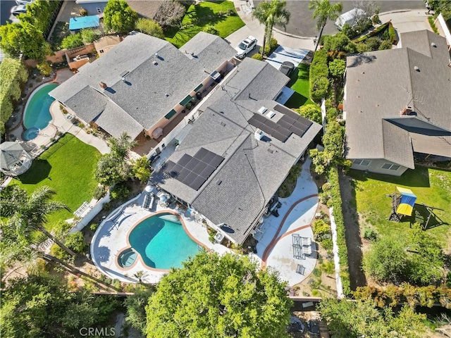 birds eye view of property with a residential view