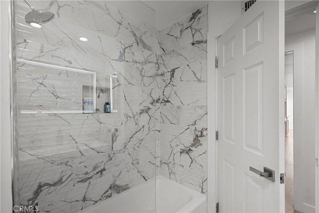 full bath featuring a combined bath / shower with marble appearance and recessed lighting