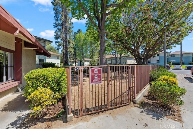 3614 Kalsman Dr Unit 1, Los Angeles, CA 90016 - view of gate featuring a residential view and fence