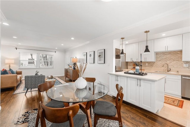 3614 Kalsman Dr Unit 1, Los Angeles, CA 90016 - dining space featuring crown molding, recessed lighting, and dark wood finished floors