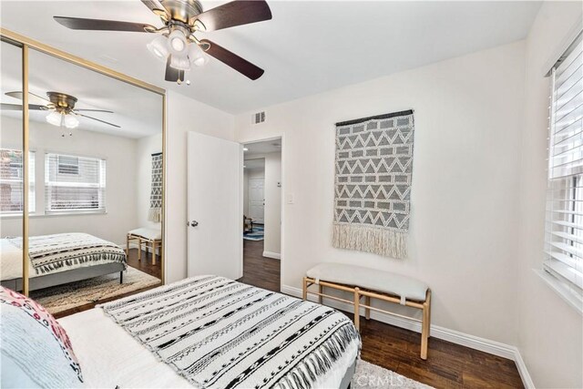 3614 Kalsman Dr Unit 1, Los Angeles, CA 90016 - bedroom with a closet, visible vents, wood finished floors, multiple windows, and baseboards