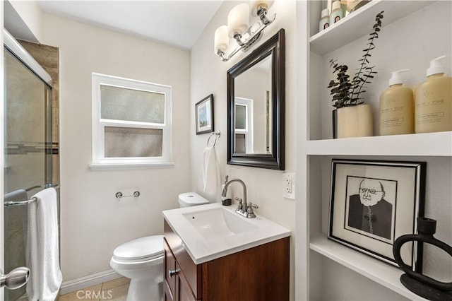 3614 Kalsman Dr Unit 1, Los Angeles, CA 90016 - full bath with toilet, a shower with shower door, vanity, and baseboards