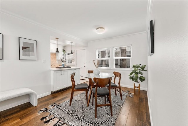 3614 Kalsman Dr Unit 1, Los Angeles, CA 90016 - dining space featuring crown molding, dark wood-style flooring, and baseboards