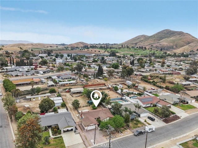 aerial view with a mountain view and a residential view