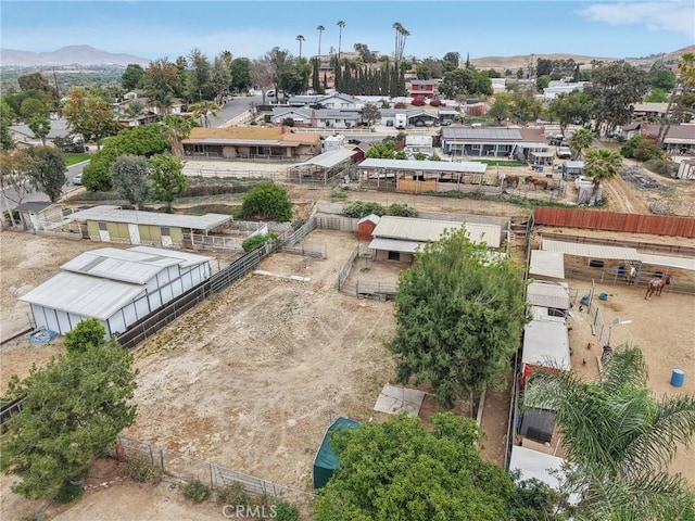 birds eye view of property with a residential view and a mountain view