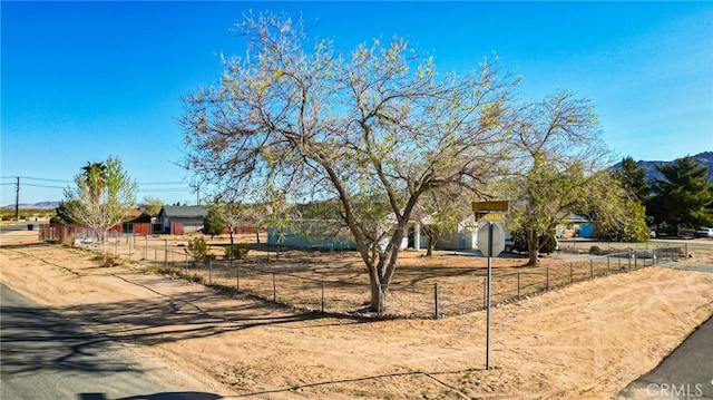 16722 Pauhaska Rd, Apple Valley, CA 92307 - view of front of home featuring a mountain view and fence private yard