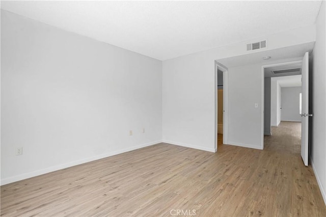 612 S Santa Fe St Unit 4, Hemet, CA 92543 - unfurnished room featuring visible vents, baseboards, and light wood-type flooring