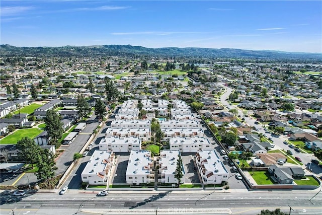 bird's eye view featuring a mountain view and a residential view