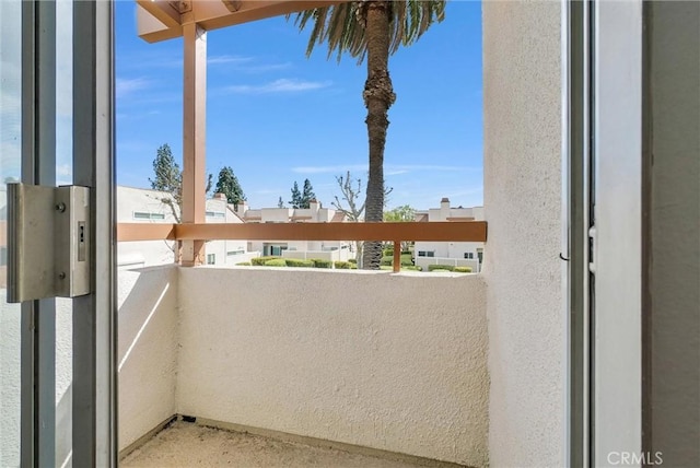balcony featuring a residential view