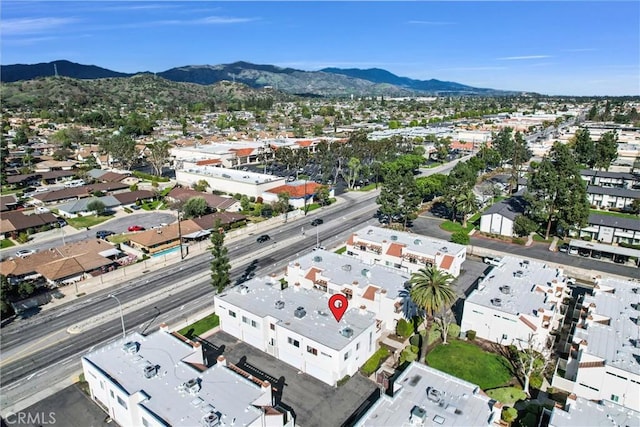 drone / aerial view featuring a mountain view