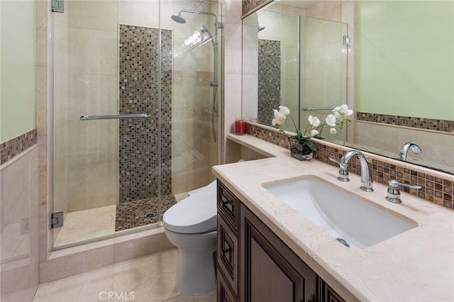 2895 Lorain Rd, San Marino, CA 91108 - bathroom featuring vanity, a stall shower, toilet, and tile walls