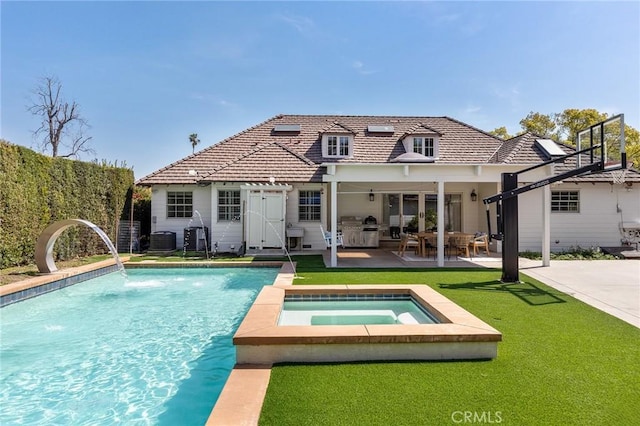 2895 Lorain Rd, San Marino, CA 91108 - rear view of house featuring an in ground hot tub, an outdoor pool, a patio area, central AC, and a yard