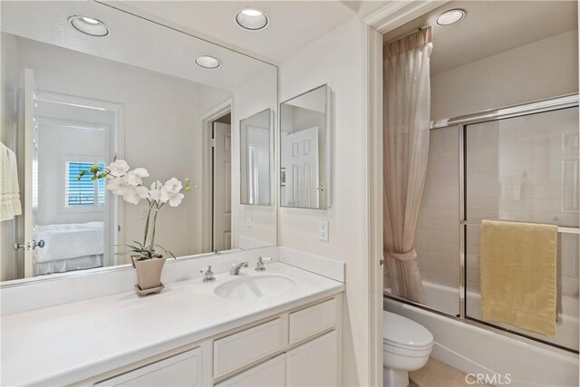 10 Cavalier, Laguna Niguel, CA 92677 - bathroom with enclosed tub / shower combo, vanity, ensuite bath, and recessed lighting
