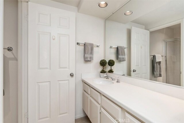 10 Cavalier, Laguna Niguel, CA 92677 - full bath with vanity, a shower stall, and recessed lighting
