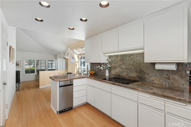 10 Cavalier, Laguna Niguel, CA 92677 - kitchen with white cabinets, light wood finished floors, a peninsula, decorative backsplash, and recessed lighting
