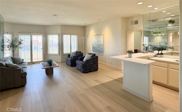 10 Cavalier, Laguna Niguel, CA 92677 - living room featuring light wood-style flooring and recessed lighting