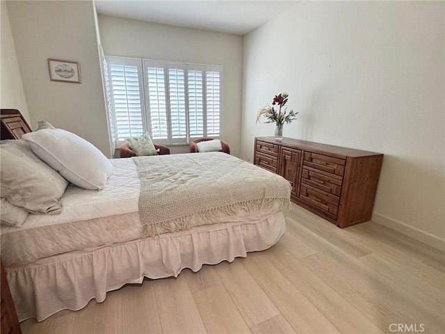 10 Cavalier, Laguna Niguel, CA 92677 - bedroom featuring light wood-style flooring and baseboards